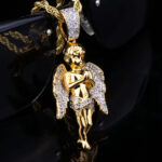 Luxury Iced Out Men’s Angel Moissanite Pendant Necklace in 14K Gold/White Gold Bio: Elevate your style with this stunning iced out men’s angel pendant necklace, featuring high-quality moissanite stones set in genuine 14K gold or white gold. Perfect for any occasion!