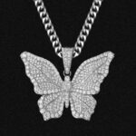 Stunning Iced Out Men’s Moissanite Butterfly Pendant in White Gold