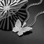 Stunning Iced Out Men’s Moissanite Butterfly Pendant in White Gold