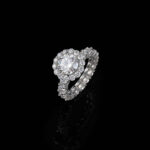 Elegant Solitaire Halo Engagement Ring with Side Diamond Accents